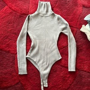 Taupe turtle neck body suit
